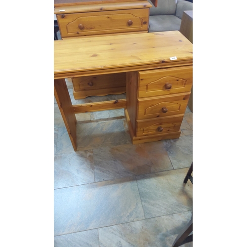 302 - Pine desk with three drawers and natural finish. It features sturdy construction with classic knotte... 