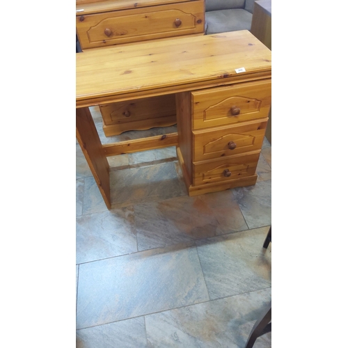 302 - Pine desk with three drawers and natural finish. It features sturdy construction with classic knotte... 