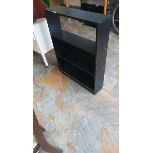 310 - Black wooden bookshelf with three spacious shelves. Contemporary design.