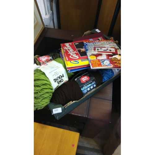 320 - Assorted crafting materials including yarn and knitting books.