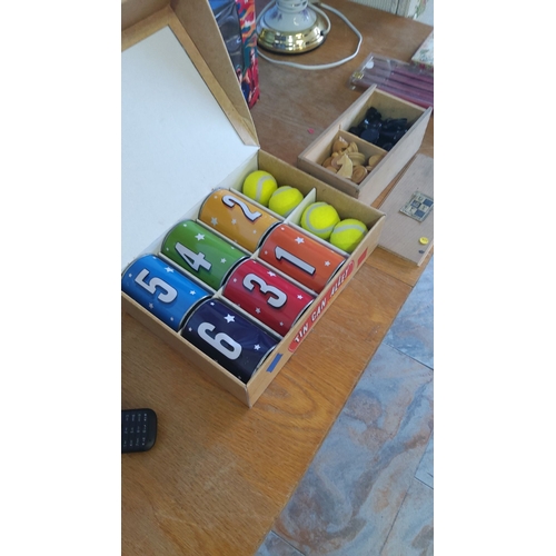 337 - Tin Can Alley Game Set includes numbered colorful cans and tennis balls, complete in original packag... 