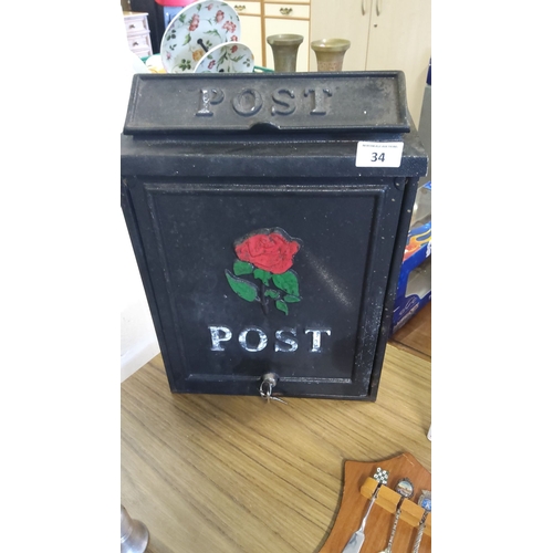 34 - Vintage black metal post box with embossed lettering and hand-painted rose motif. Lockable design wi... 