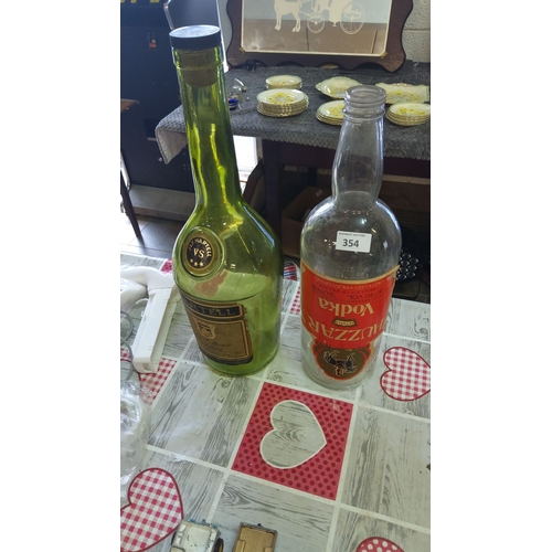 354 - Pair of vintage 3 litre display liquor bottles: Martell VS Cognac and Huzzar Vodka.