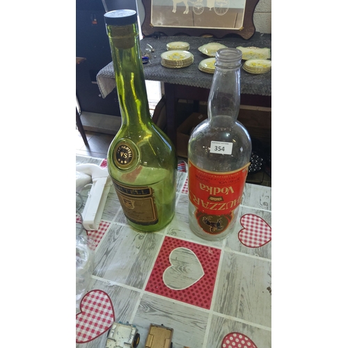 354 - Pair of vintage 3 litre display liquor bottles: Martell VS Cognac and Huzzar Vodka.