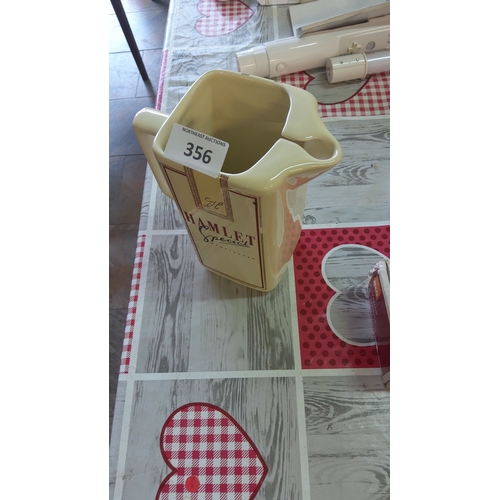 356 - Ceramic jug with 