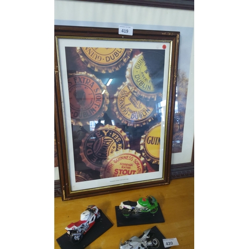 419 - Framed original print of Guinness bottle caps showcases vintage Dublin stout branding.
