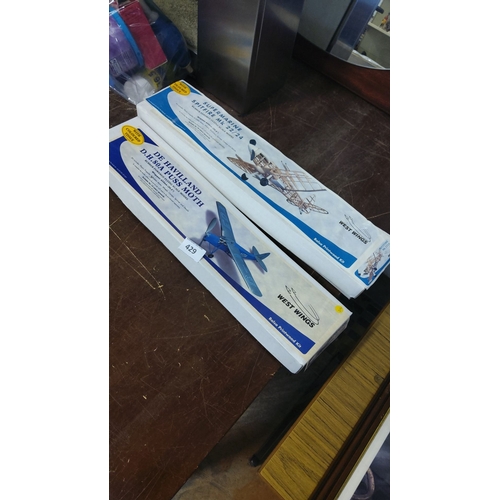 429 - Two West Wings balsa wood kits: Supermarine Spitfire Mk.22/24 and De Havilland D.H.80A Puss Moth.