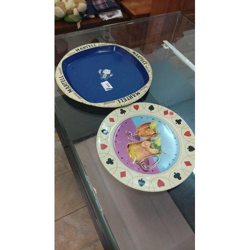 448 - Pair of decorative trays featuring vintage branding: Martell Cognac and Pimm's. Metal construction w... 