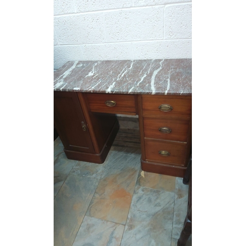453 - Mahogany sideboard with marble top. Features brass handles, four drawers, and a cupboard. Mid-centur... 