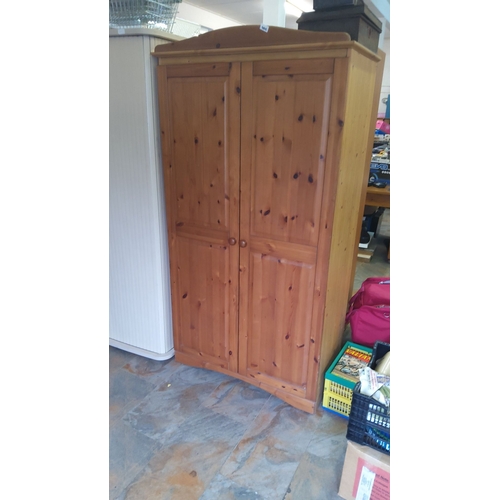 462 - Pine wardrobe with double doors and internal shelf. Simple, classic design.