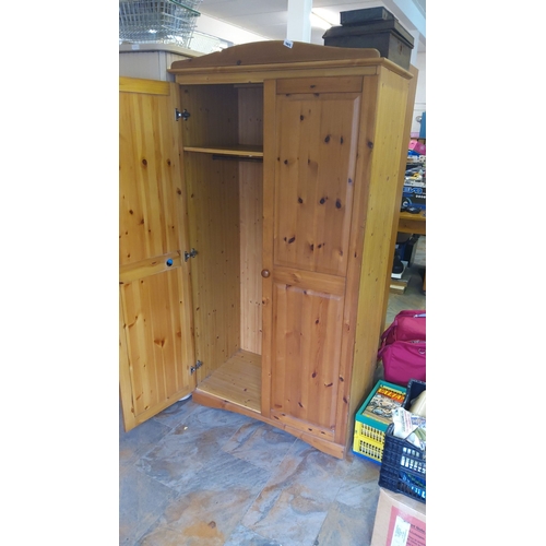 462 - Pine wardrobe with double doors and internal shelf. Simple, classic design.