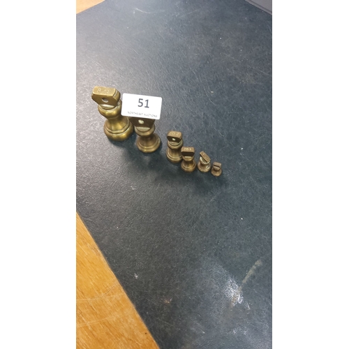 51 - Set of six vintage brass apothecary weights, ranging from 1/2 oz to 8 oz.