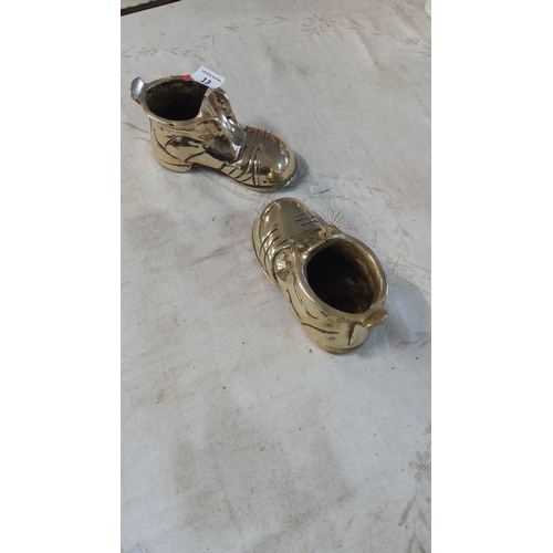 13 - Pair of solid brass boot vases, decorative and charming.