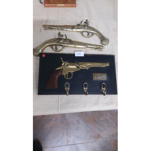 170 - Set includes decorative brass replica firearms: two flintlock pistols and one Colt 51 revolver-style... 