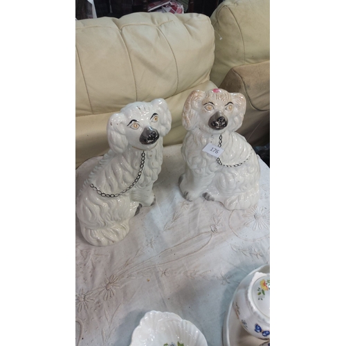 176 - Pair of Staffordshire pottery spaniels, Victorian-style, white with painted chain detail, from the 1... 