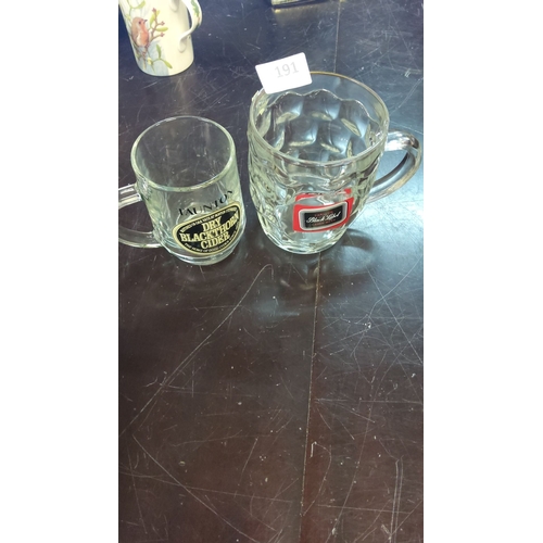 191 - Pair of glass beer mugs feature 