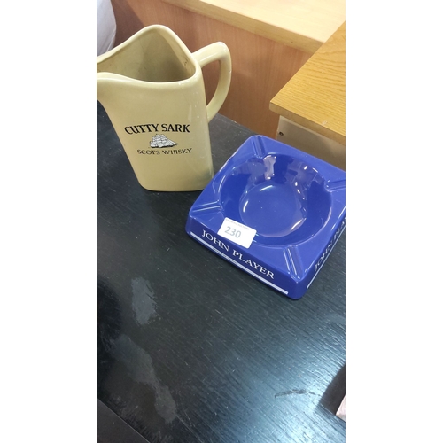 230 - Vintage Cutty Sark whisky jug and John Player ashtray made of durable ceramic.