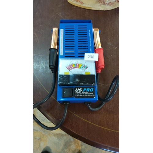 238 - US.PRO battery tester with gauge, cables, and on/off switch. Compact design.