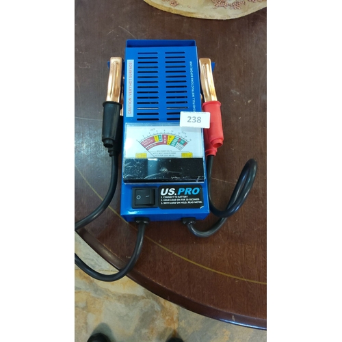 238 - US.PRO battery tester with gauge, cables, and on/off switch. Compact design.