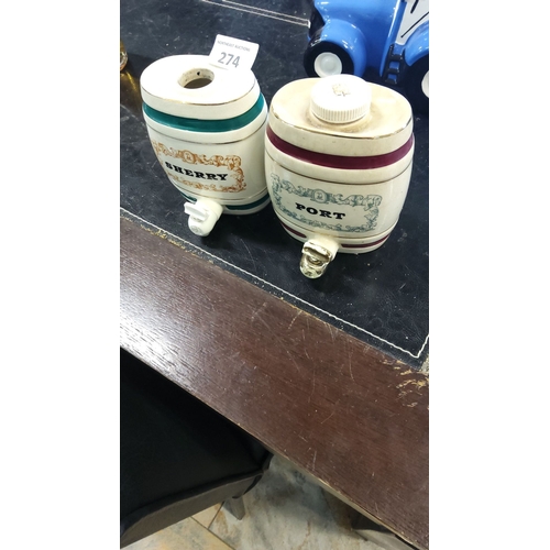 274 - Pair of vintage ceramic spirit barrels labeled 