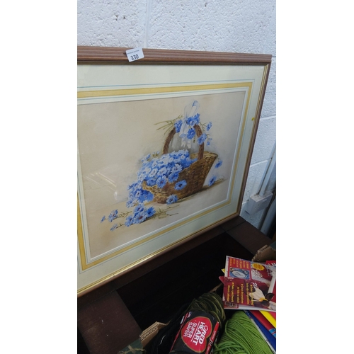 330 - Watercolor print of a basket filled with blue cornflowers. Framed with a wooden and gold-tone border... 