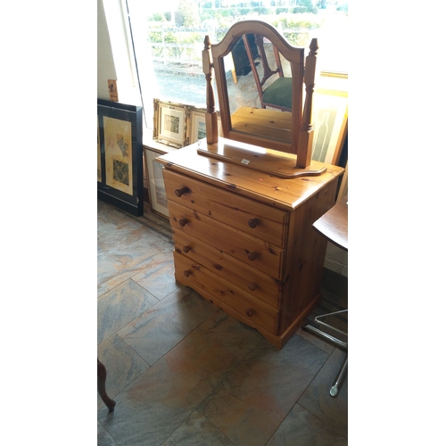 337 - 4 Drawer Pine dresser with mirror, featuring . Simple and practical design.