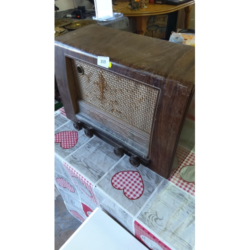 359 - Vintage wooden radio for restoration with woven speaker grille, featuring four control knobs, from t... 