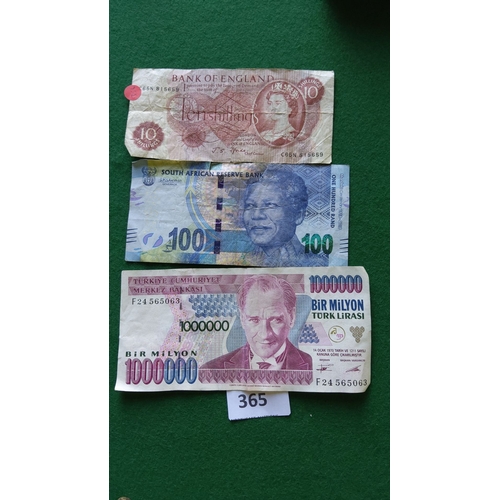 365 - Collection of three banknotes: Bank of England ten shillings, South African Reserve Bank 100 Rand, a... 