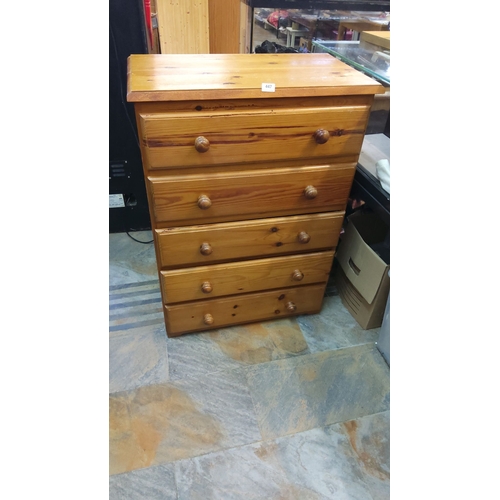 447 - Pine chest of drawers, four drawers, wooden knobs, natural finish.