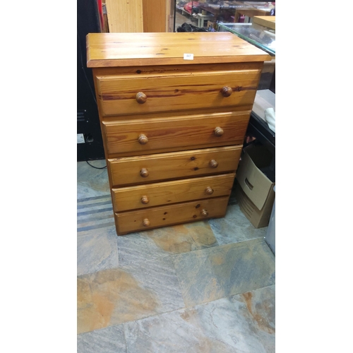 447 - Pine chest of drawers, four drawers, wooden knobs, natural finish.