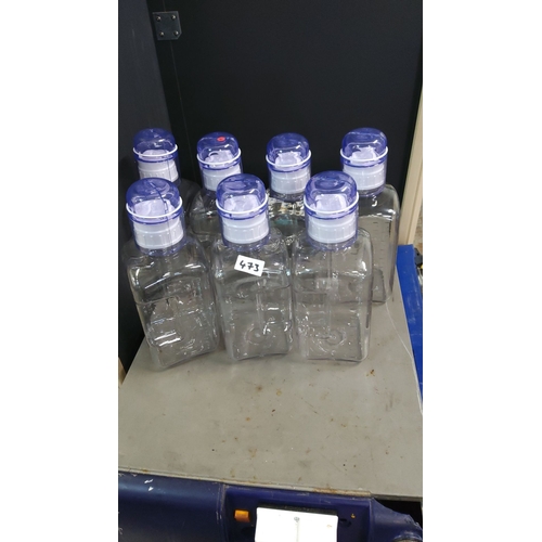 473 - Set of 7 x 2000ml clear plastic sterile storage containers with blue lids.