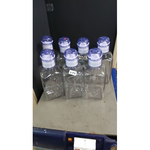 473 - Set of 7 x 2000ml clear plastic sterile storage containers with blue lids.