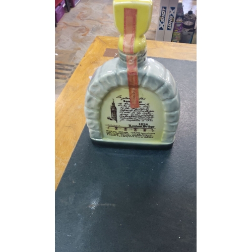 49 - Ceramic Jim Beam decanter depicts the 1971 move of London Bridge to Lake Havasu City, Arizona. It is... 