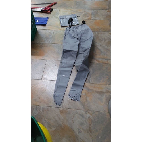 490 - Pair of pull up waterproof trousers