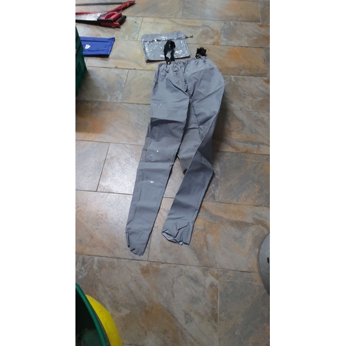 490 - Pair of pull up waterproof trousers