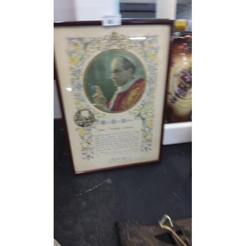 80 - Framed color portrait of a religious figure with ornate floral border, featuring a Latin inscription... 