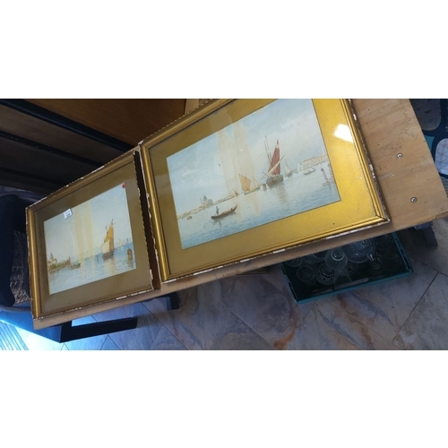 326 - Pair of framed prints depicting nautical scenes. Gold frames with matted borders accentuate vibrant ... 