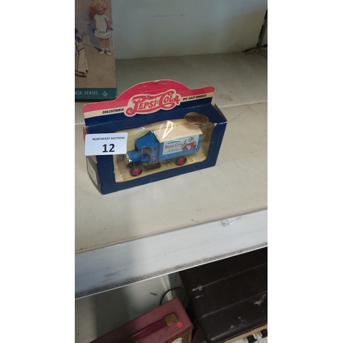 12 - Collectible die-cast model of a 1926 Dennis Delivery Van, boxed. Pepsi XMAS 1994 edition.