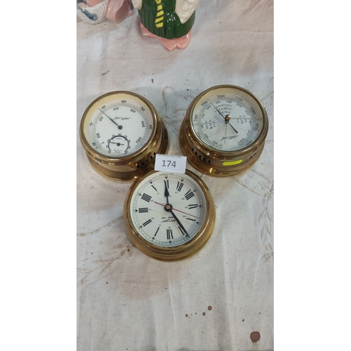 174 - Brass nautical instrument set includes a barometer, hygrometer, and clock. It features a classic des... 