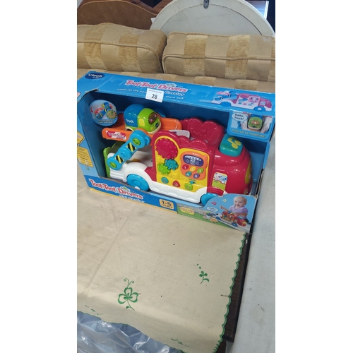 28 - VTech Baby Toot-Toot Drivers Car Carrier features engaging sounds and colorful design.