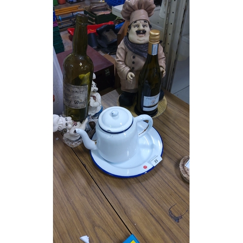 35 - Eclectic mixed lot featuring a ceramic chef figurine, a vintage enamel teapot, and decorative wine b... 