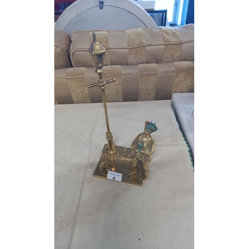 4 - Brass figurine depicting a lamplighter standing with streetlamp, detailed in a classic style.