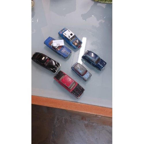 70 - Set of six vintage die-cast toy cars in various colors.