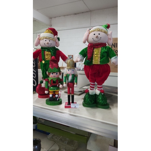 2 - Set of 4 festive Christmas figurines, including two plush figures and two wooden figures, decorated ... 