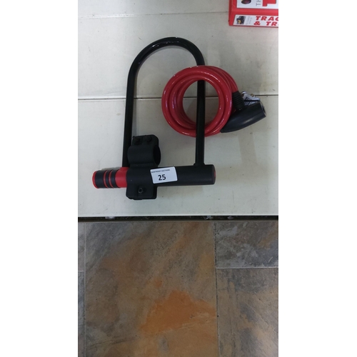 25 - U-lock with red cable, featuring a sturdy black handlebar mount and security lock.