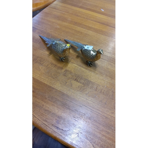 30 - Pair of brass pheasant figurines, intricately detailed with a polished finish.