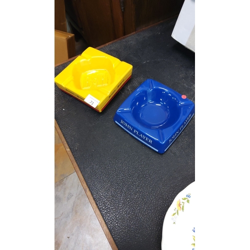 71 - Set of two vintage ceramic ashtrays, featuring vibrant 