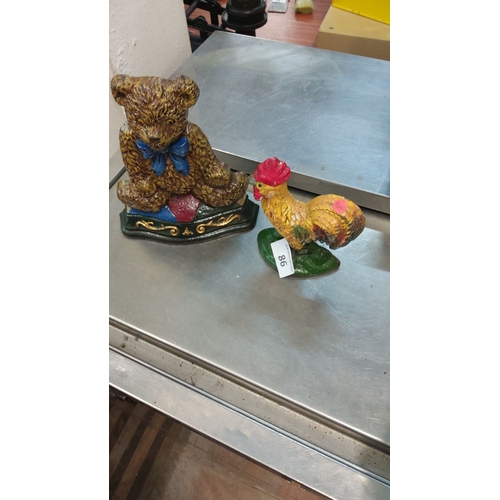 86 - Painted cast iron teddy bear and rooster doorstops, vintage-style, multicolored with intricate detai... 