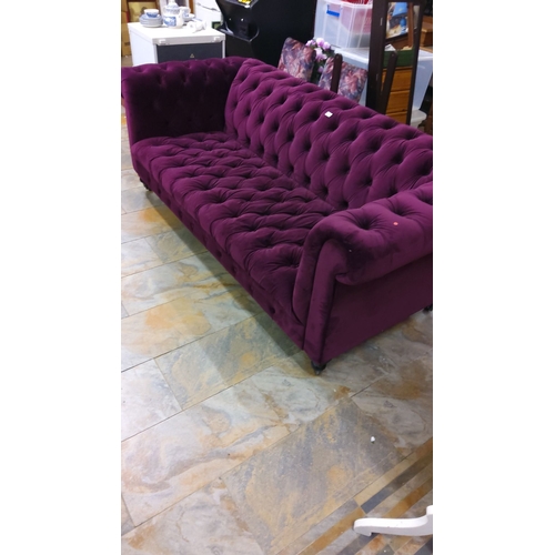 89 - Deep purple velvet sofa (chesterfield style) with tufted design and rolled arms.