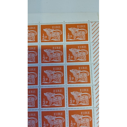 110 - Sheet of vintage Irish stamps, ½ penny denomination, featuring intricate Celtic design.(120)